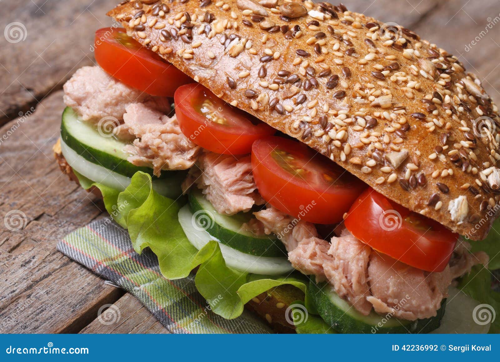 Useful Tuna Sandwich with Lettuce, Tomatoes, Cucumbers Stock Photo