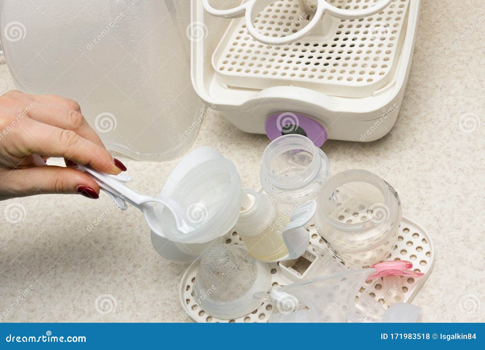 Using Baby Bottle Sterilizer Stock Photo Image of feed, dairy 171983518