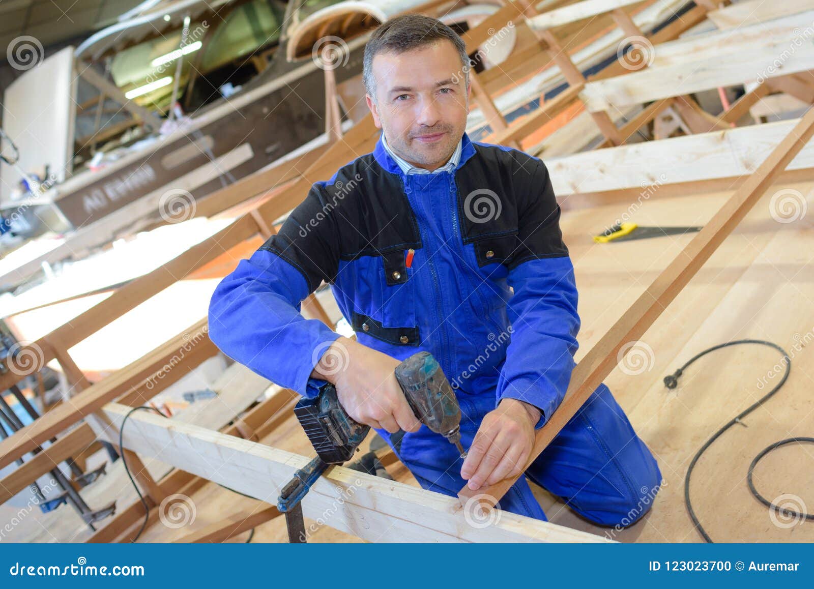 Using electric driver stock photo. Image of occupation 123023700