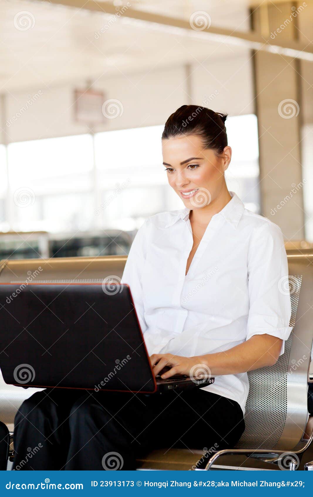 Using laptop at airport stock image. Image of beautiful 23913173