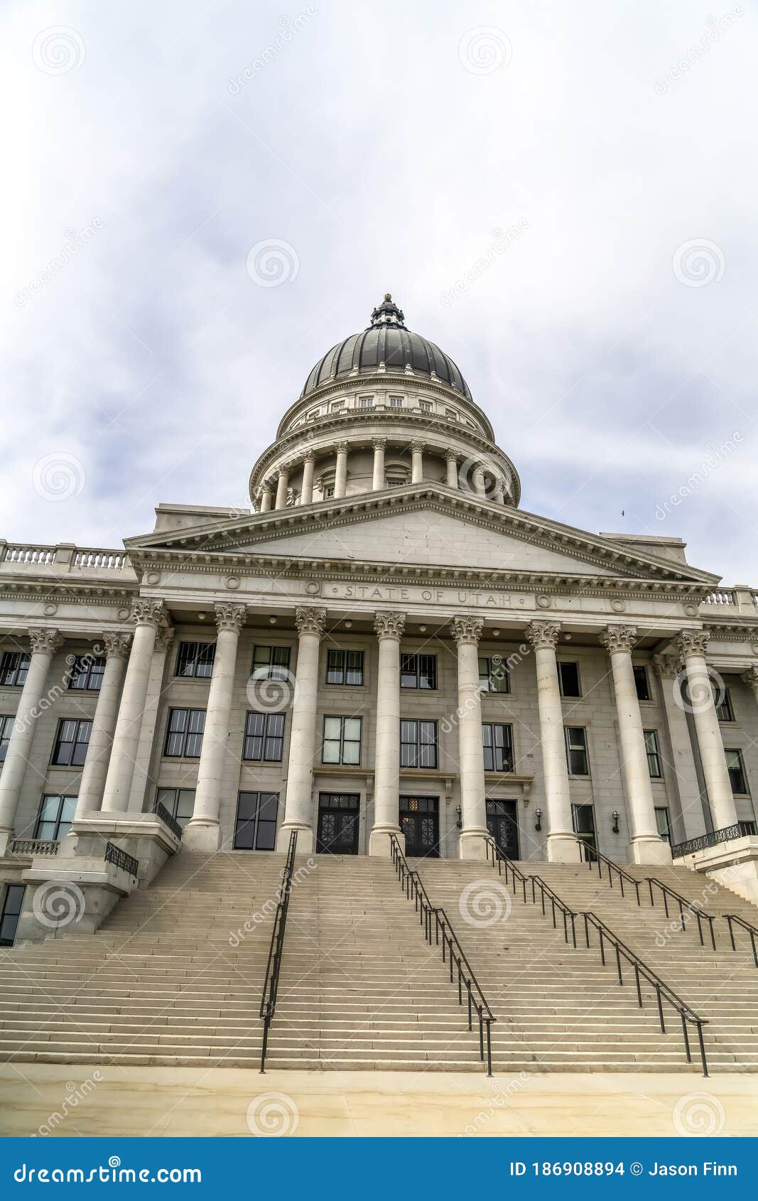 utah state capital building dome and stairs leading to the pedimented entrance
