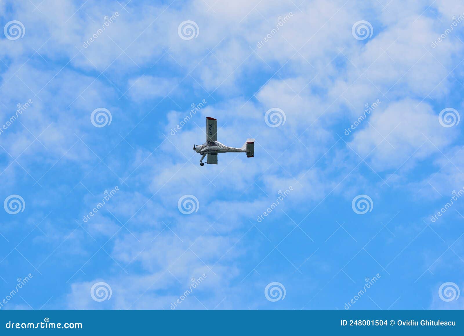 utility aircraft pzl 104 wilga 80 flying on the blue sky