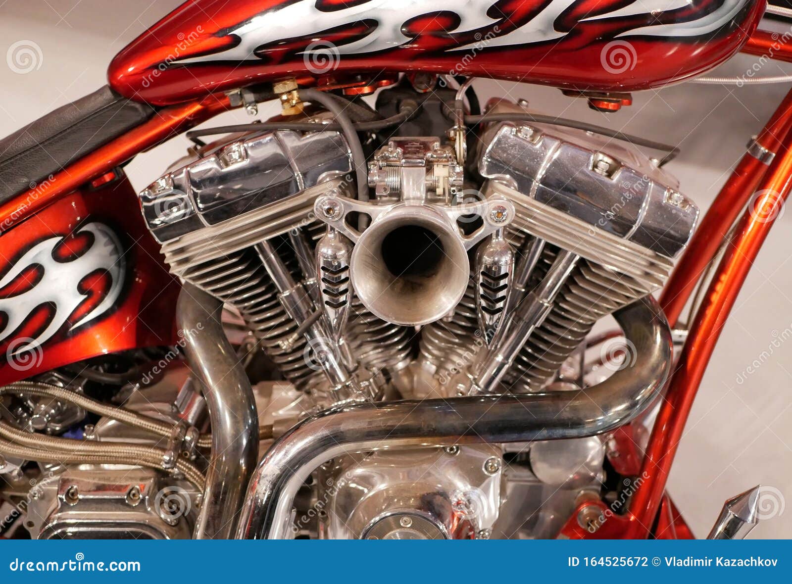 Vtype Twocylinder Motorcycle Engine with Chrome Coating. Orange