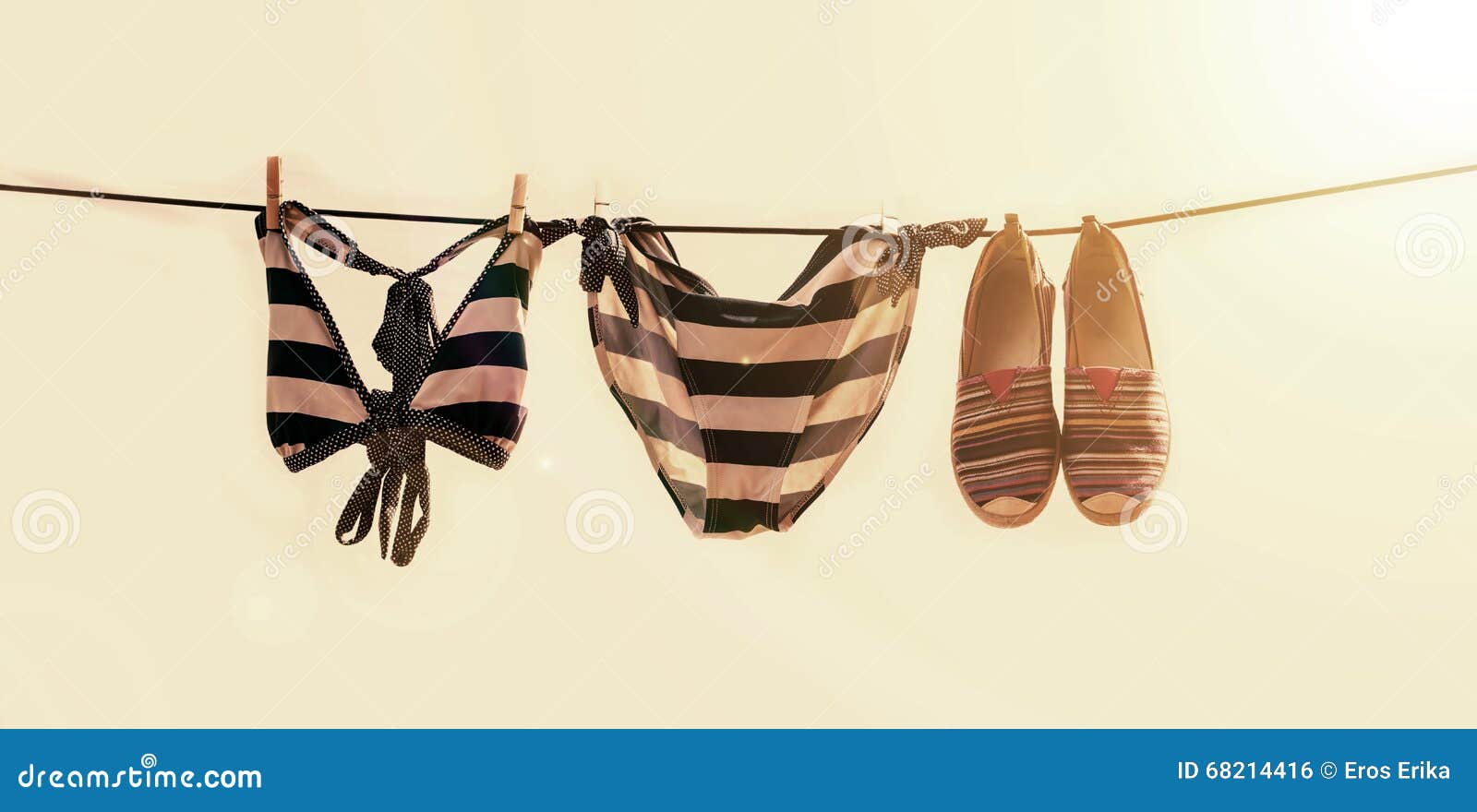 Vacation Photo of Swimsuit Drying on the Clothesline Stock Photo - Image of  vacation, holiday: 68214416