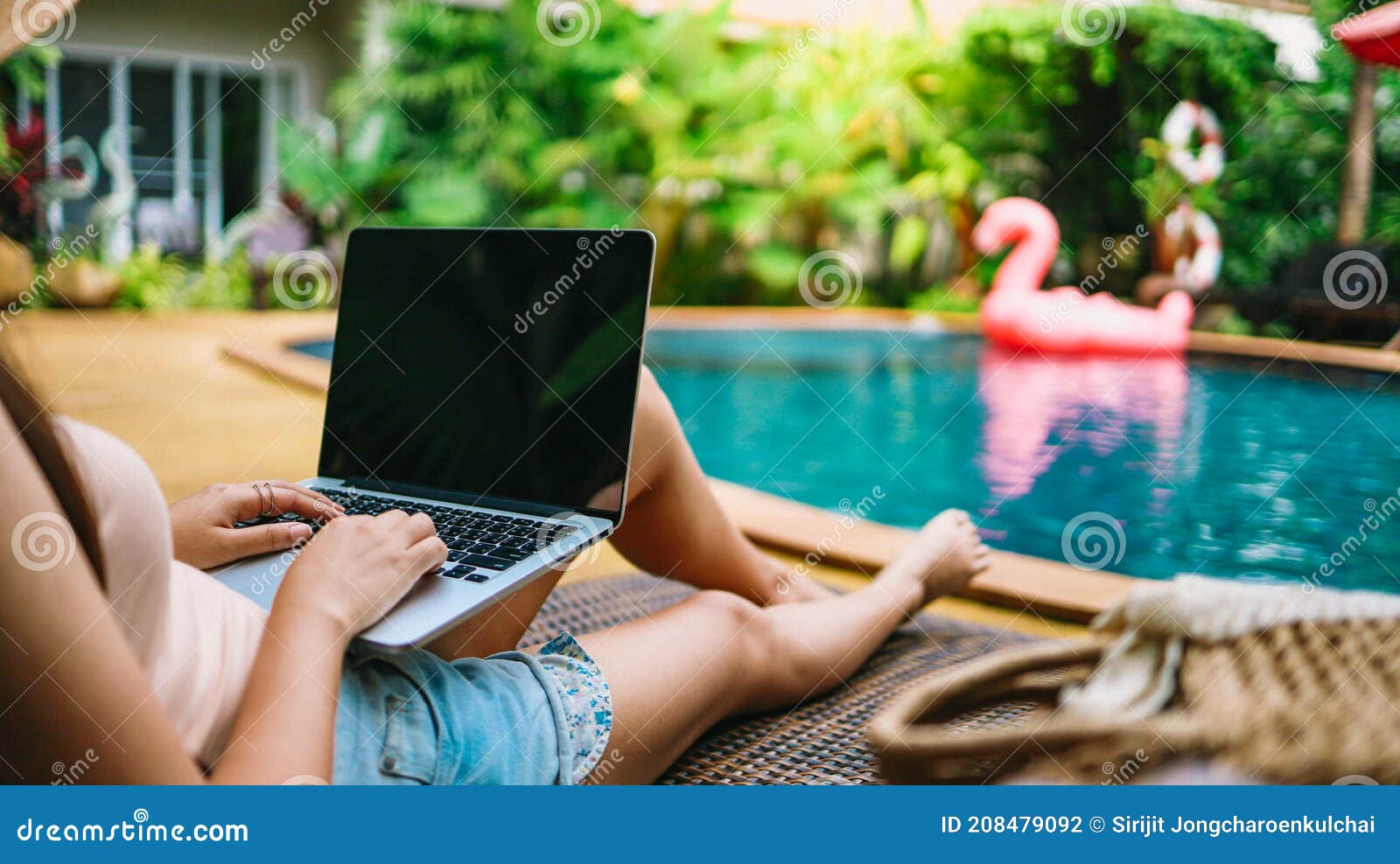 vacation woman working on her laptop in holiday  remote online working digital freelance work concept