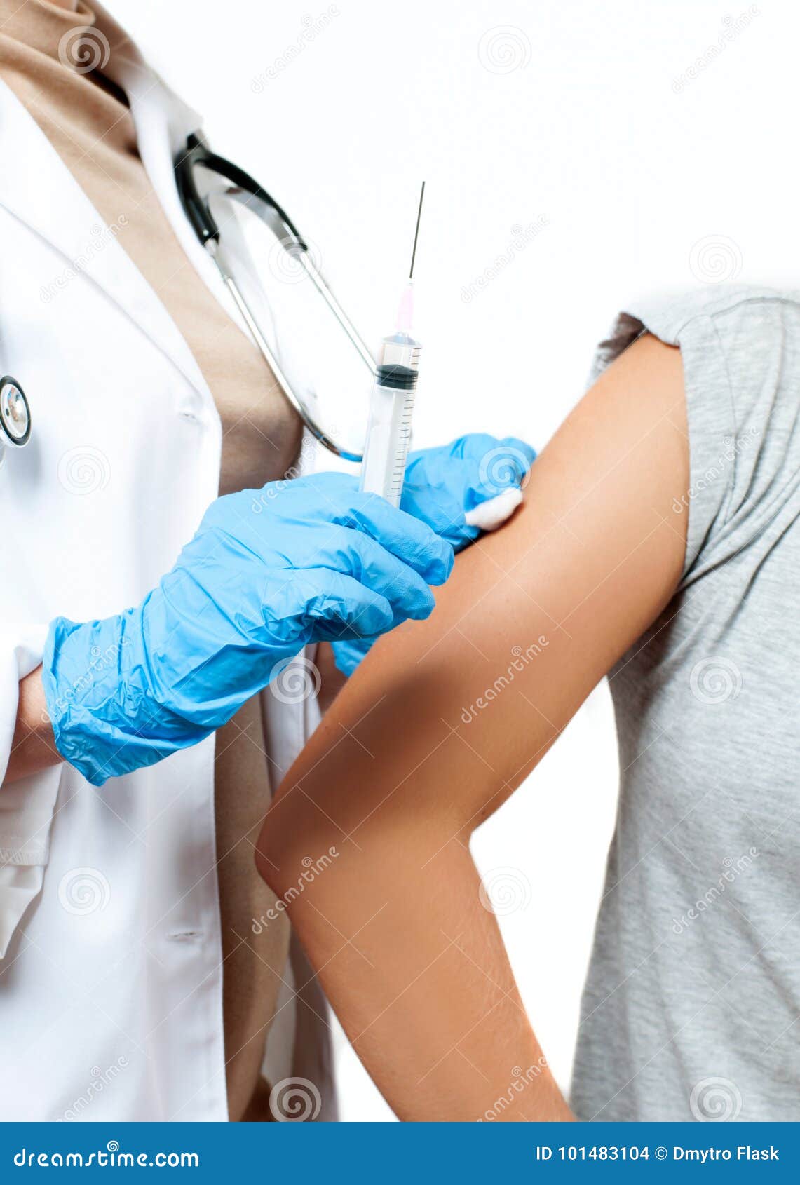 vaccination. doctor injecting flu vaccine to patient`s arm.