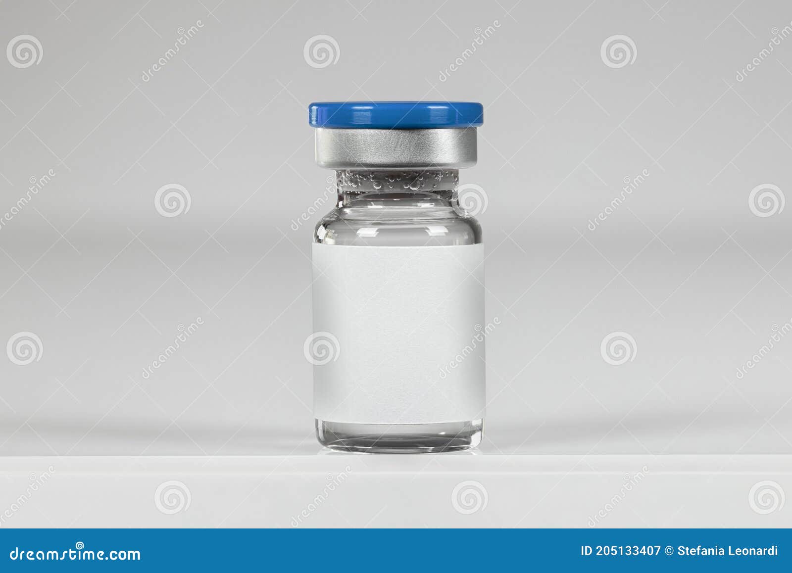 vaccine bottle  on a neutral background