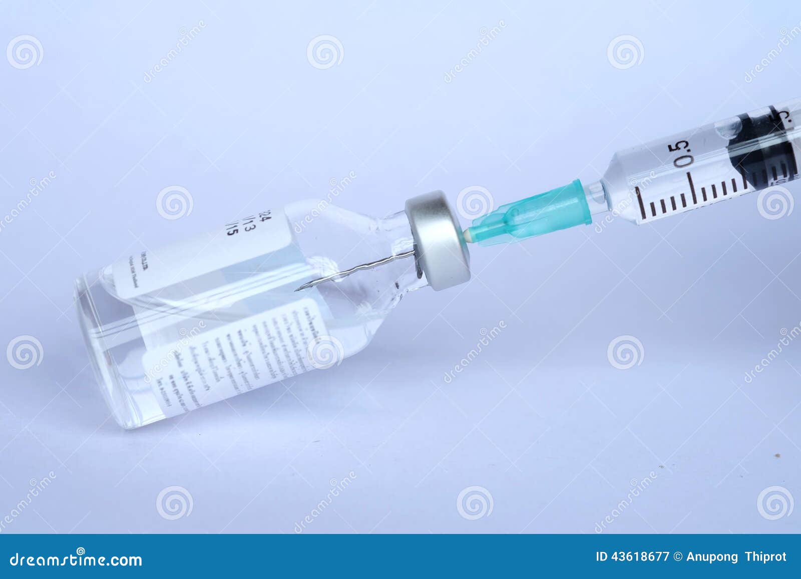 vaccine and syringe