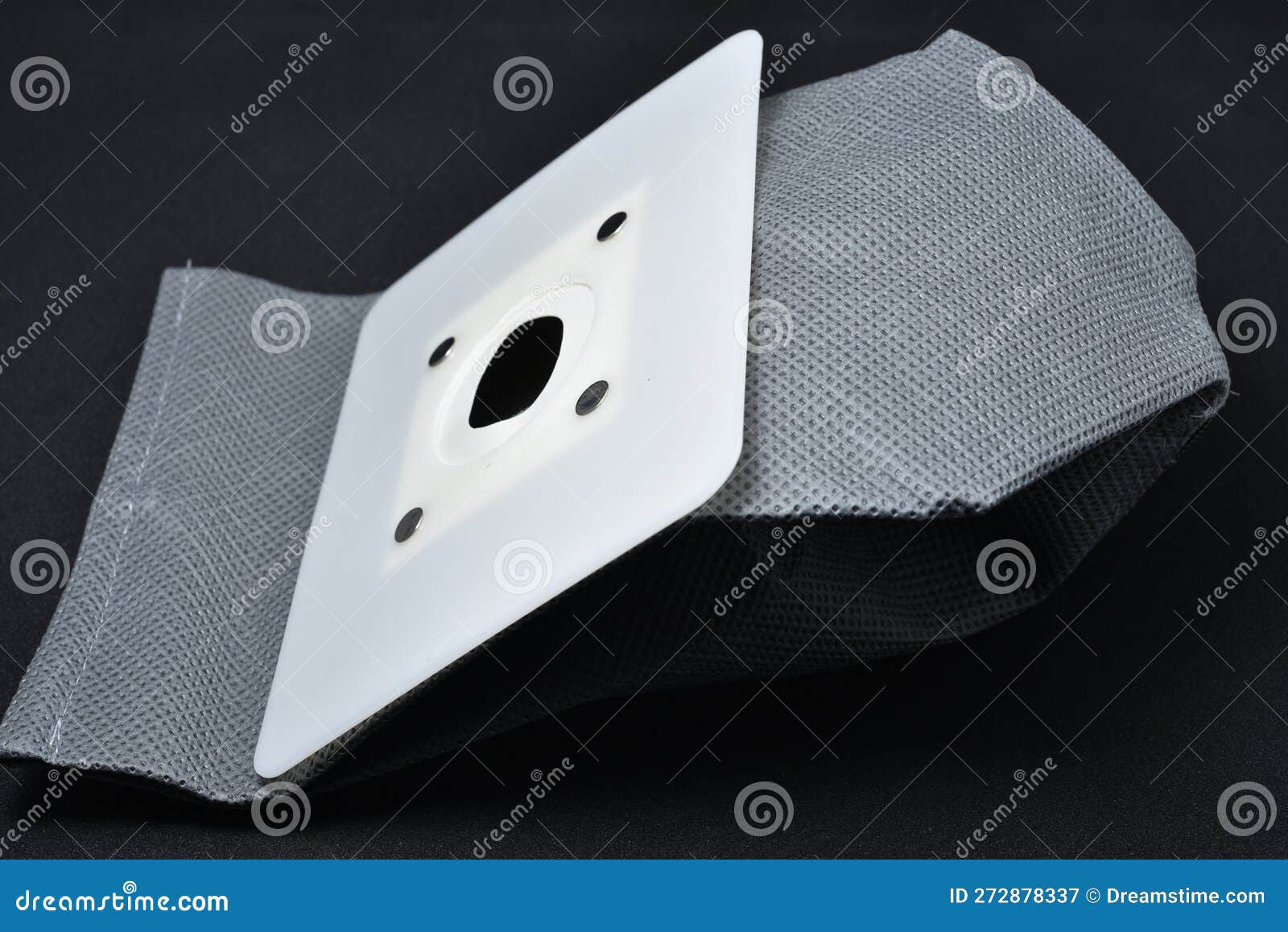 A Vacuum Cleaner Bag. Grey Bag for Collecting Dust in a Vacuum Cleaner