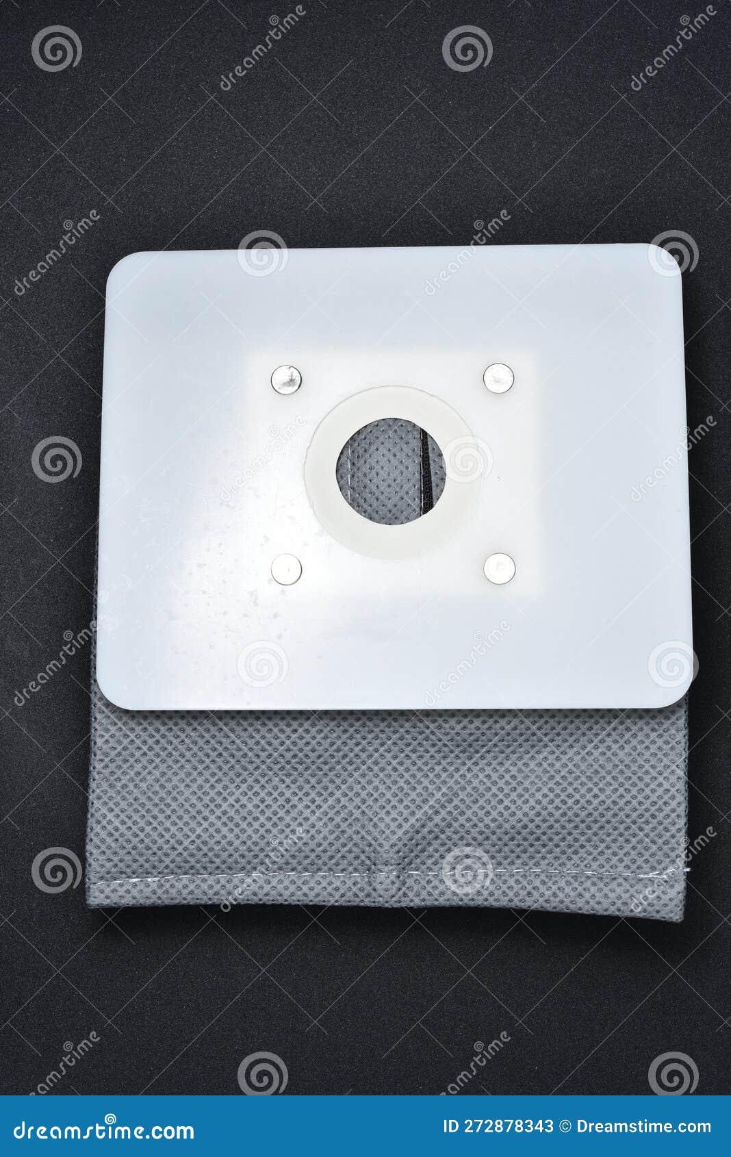 A Vacuum Cleaner Bag. Grey Bag for Collecting Dust in a Vacuum Cleaner