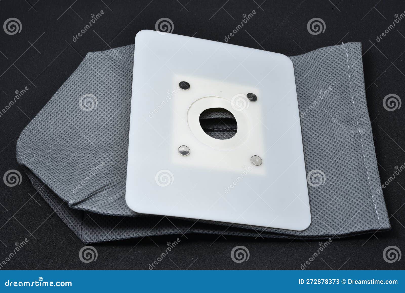 A Vacuum Cleaner Bag. Grey Bag for Collecting Dust in a Vacuum Cleaner