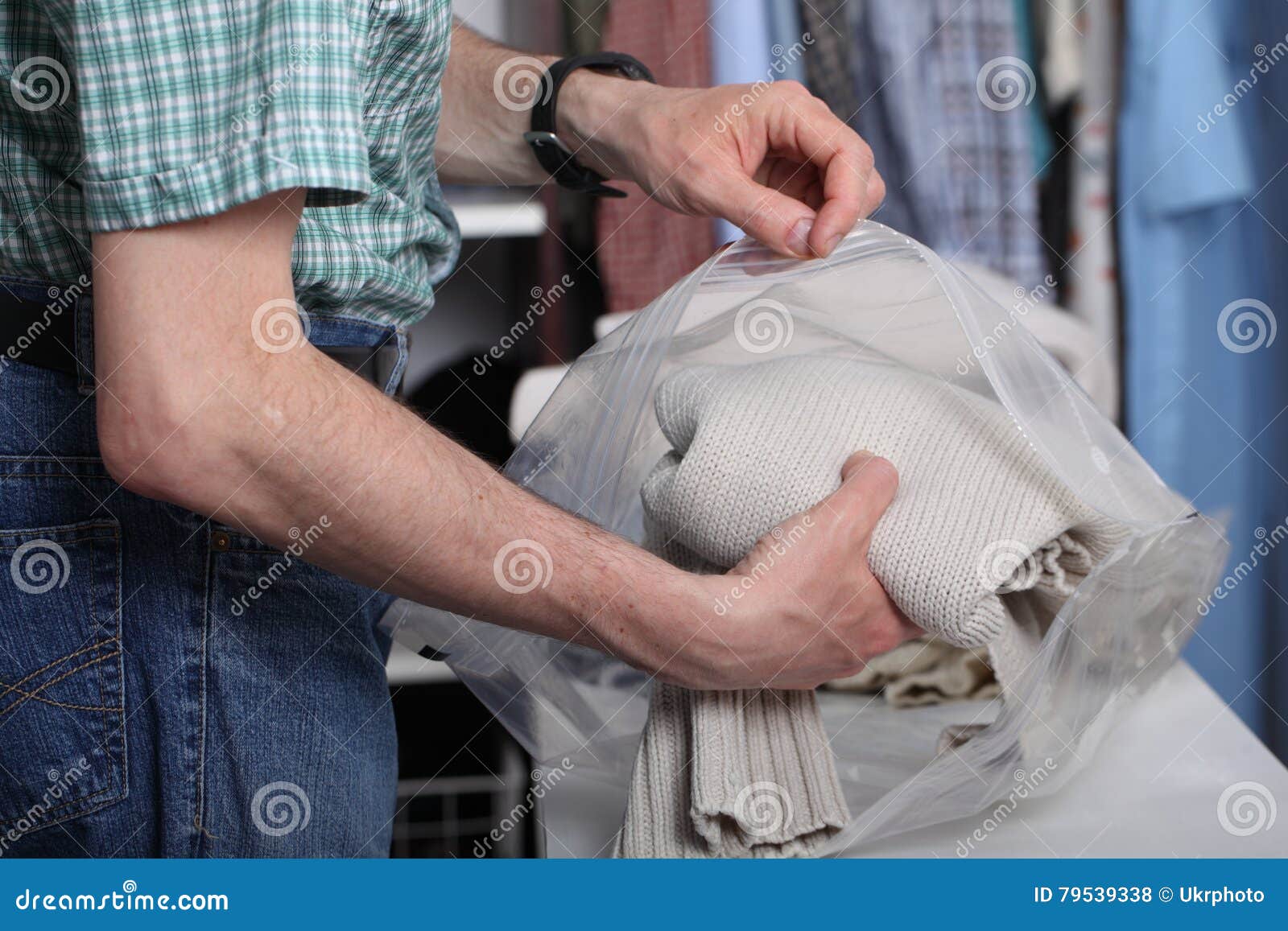Vacuum pack for clothes stock photo. Image of caucasian 79539338