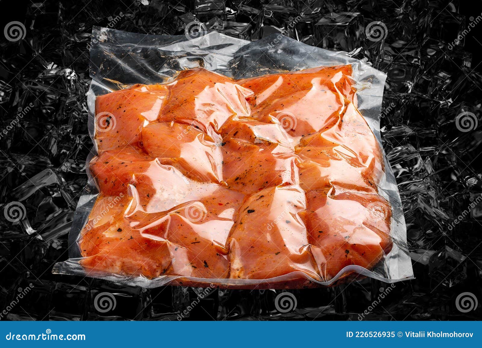 Vacuumpacked Meat, on Dark Ice Background, Chicken Fillet