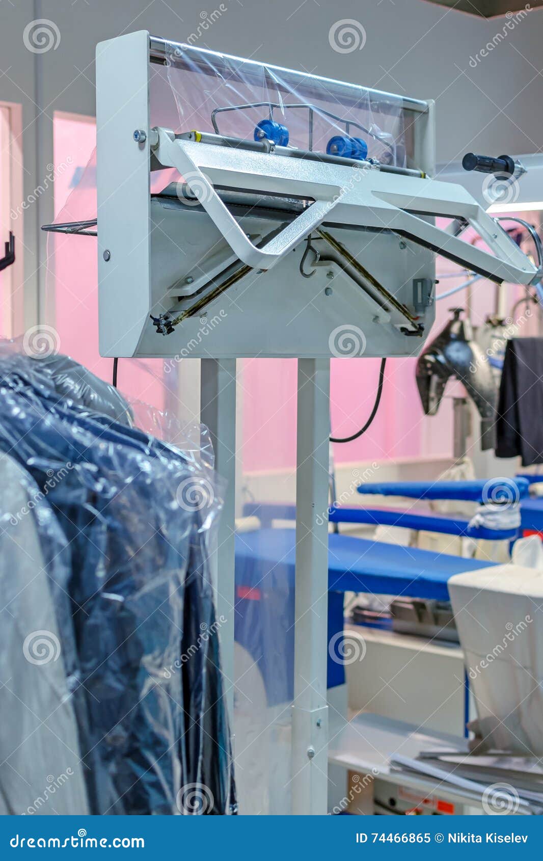 The Vacuum Packer of Clean Clothes in a Laundry Stock Image Image of