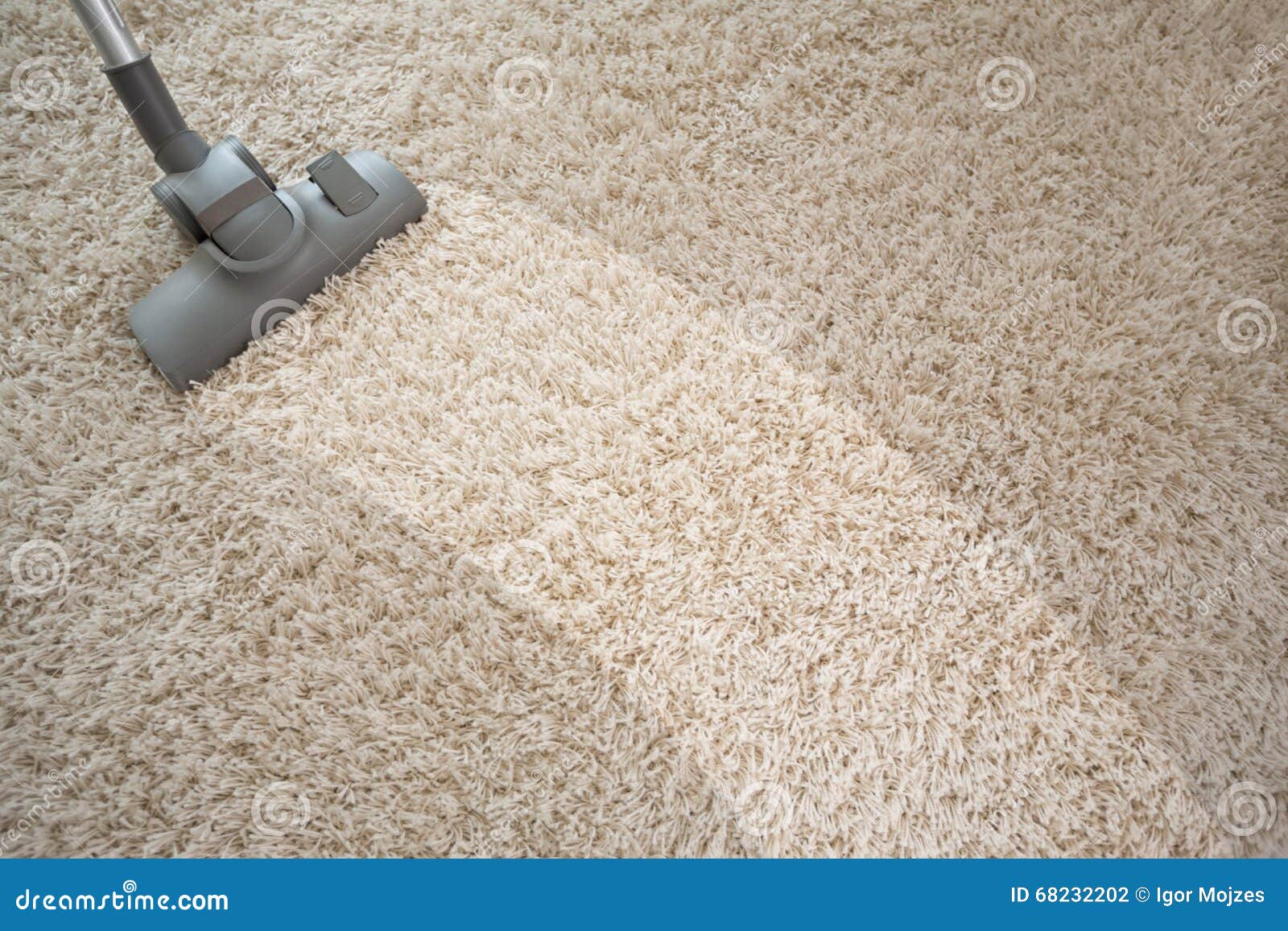 vacuuming rough carpet with vacuum cleaner