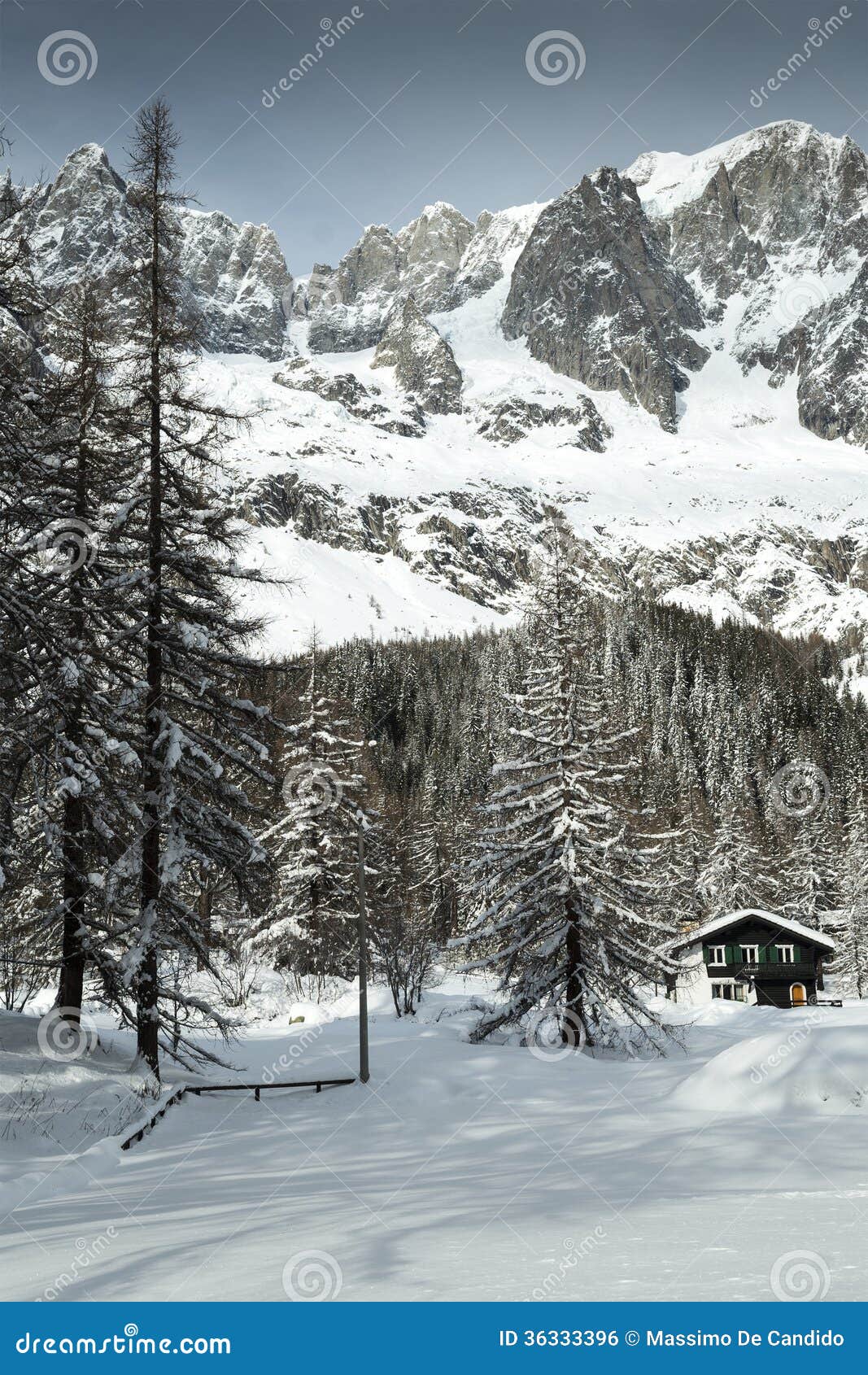 val ferret, mountain chalet in the snow among the trees