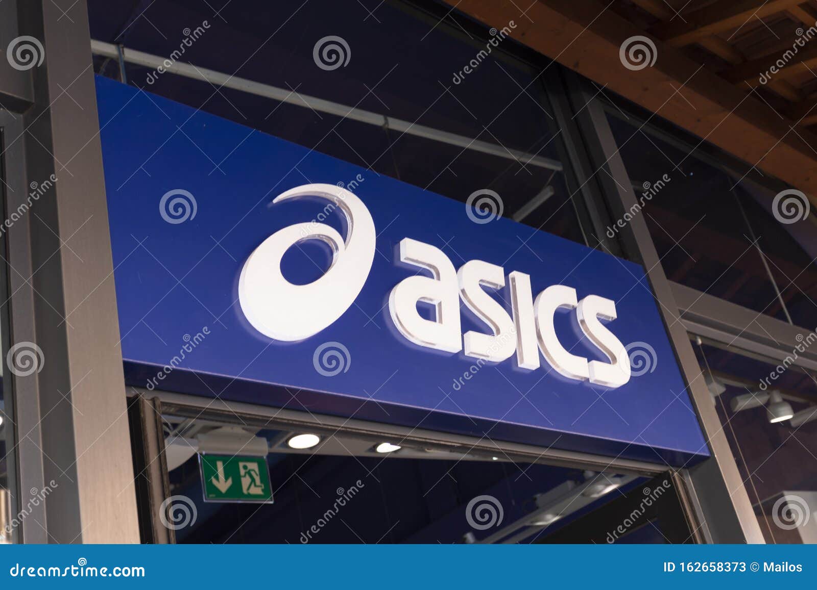 Valdichiana Outlet Italy Closeup of the Asics Lettering and Logo Its Facade Editorial Stock Photo - Image of town, exterior: 162658373