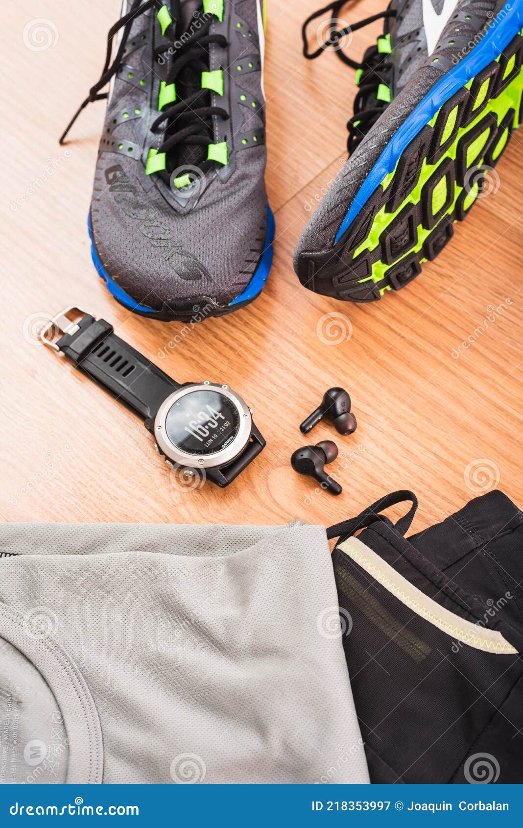 Valencia, Spain - May 9, 2021: Brooks Running Shoes and Garmin Sports Watch, Top Brands in Sports Equipment, on the Floor before Editorial of jogging, brooks: 218353997