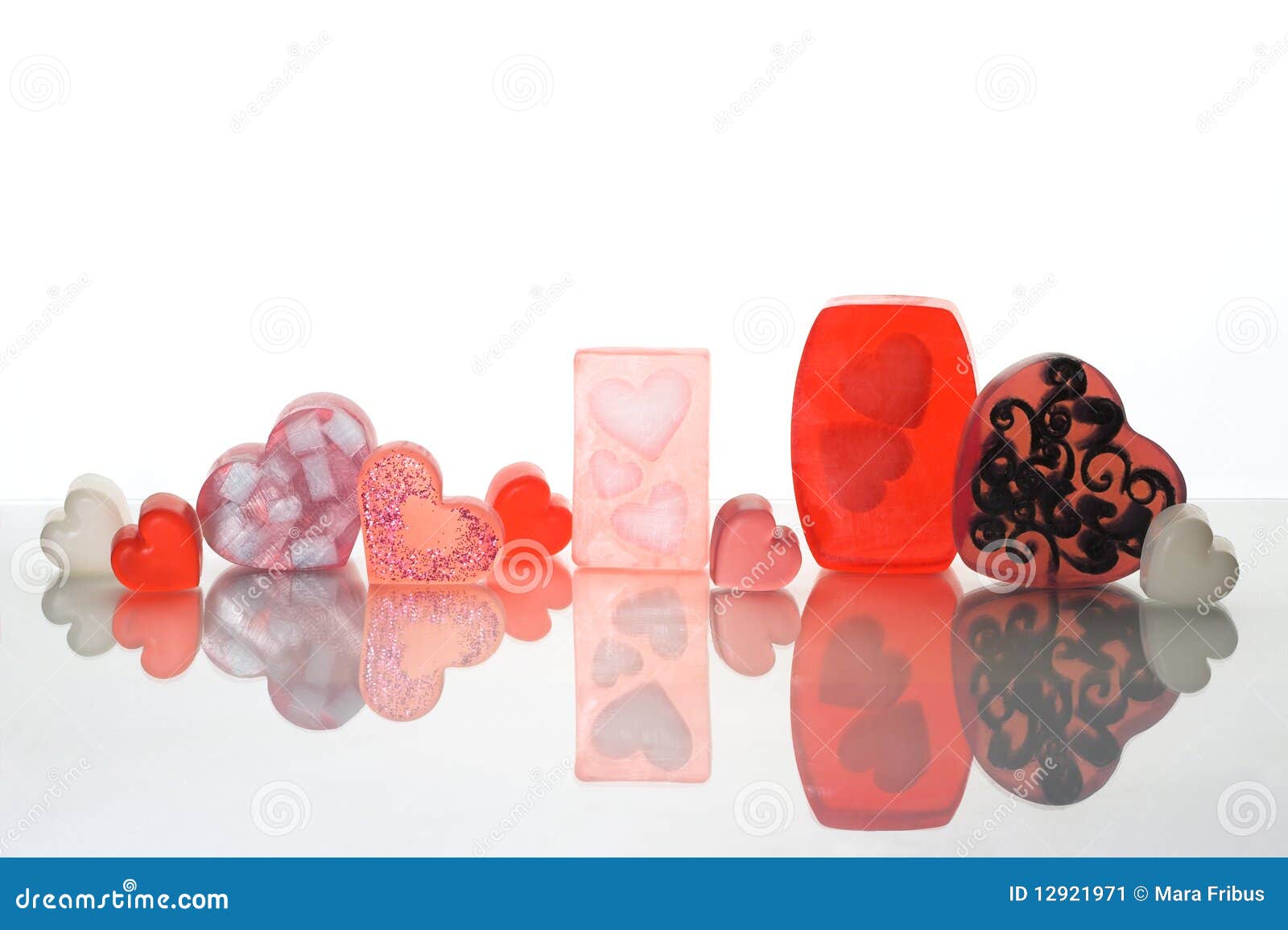 Heart Shaped Soaps on Pink Surface · Free Stock Photo