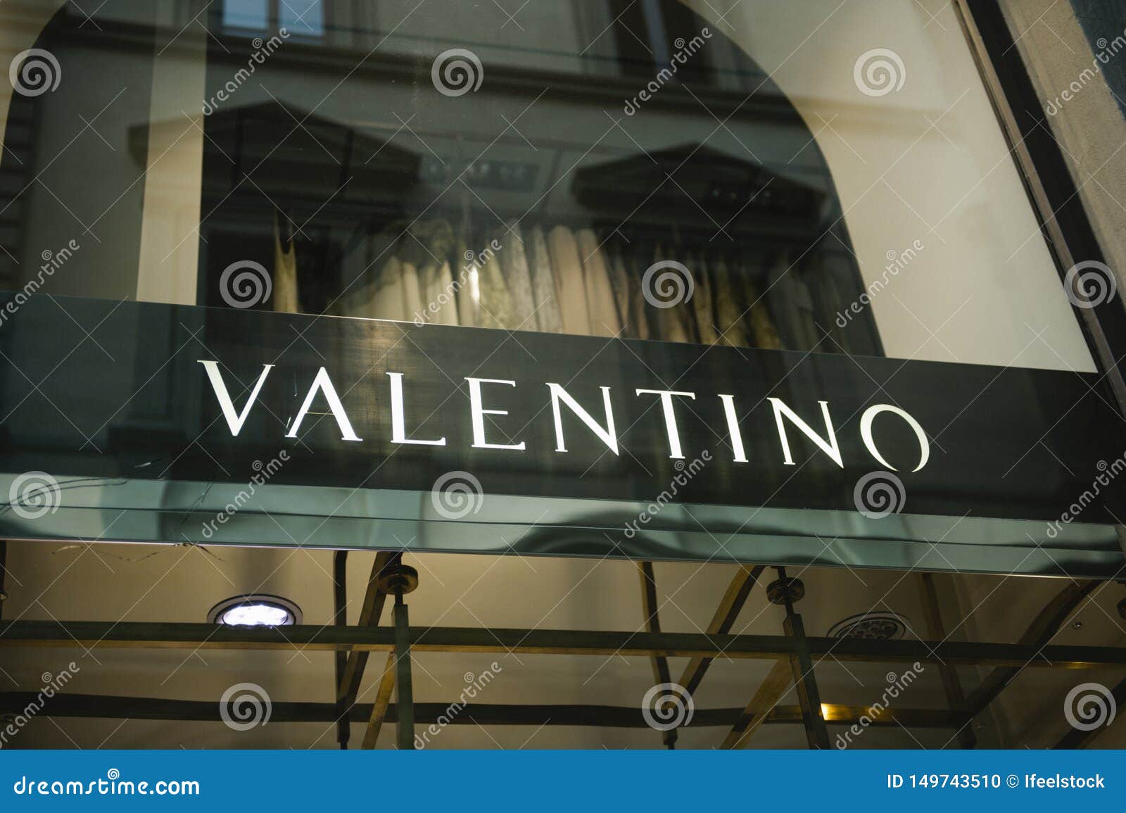 Valentino Fashion Brand Sign on the Showcas Editorial Image - Image of ...