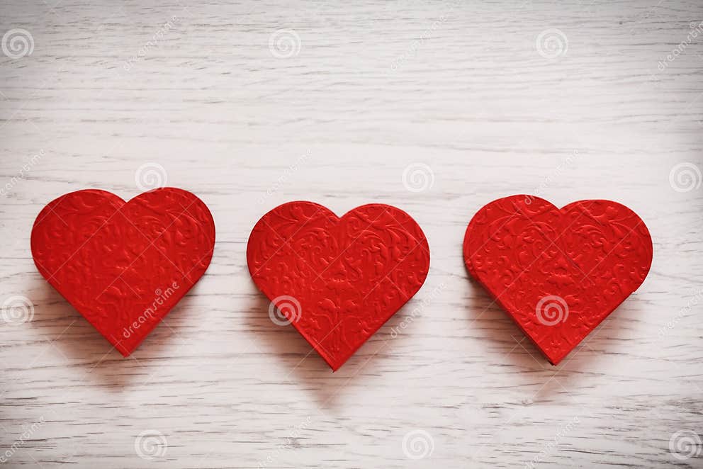 Valentinsgrußtageshintergrund Mit Drei Herzen Stockbild Bild von