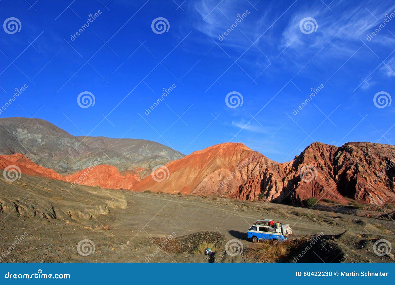 van on the hill of seven colors, cerro de los siete colores, at purmamarca, jujuy, argentina