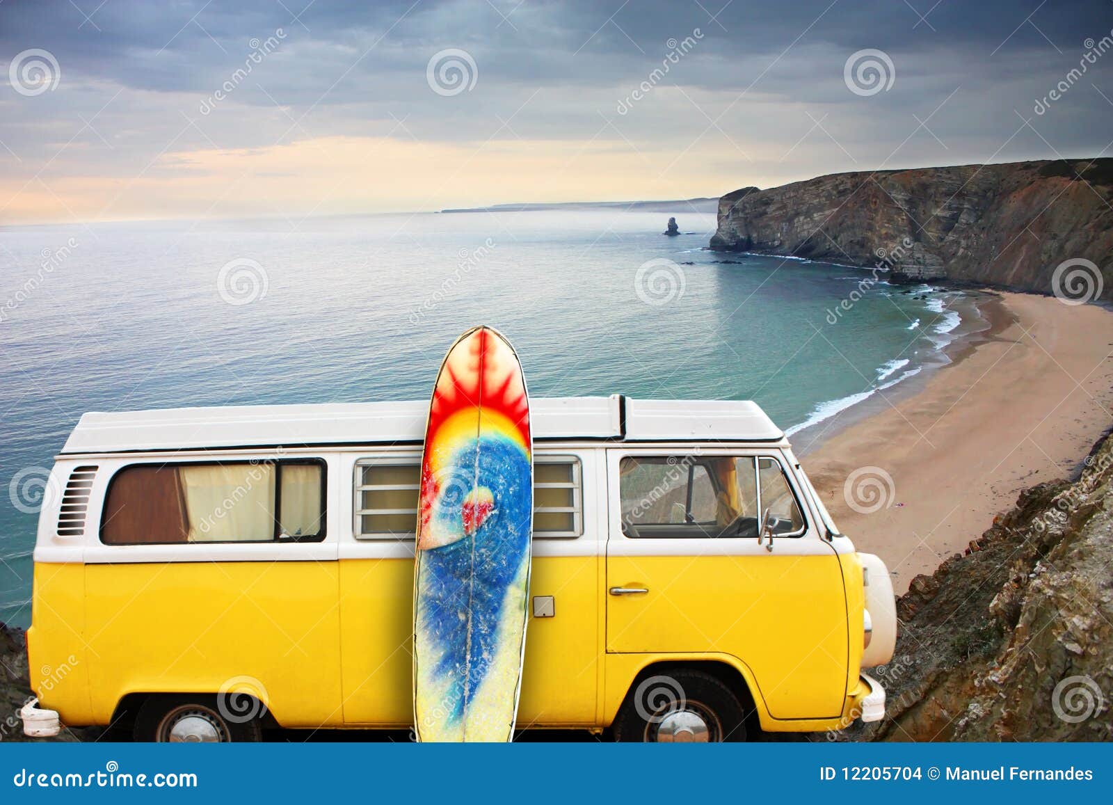 van and surf board at a beach