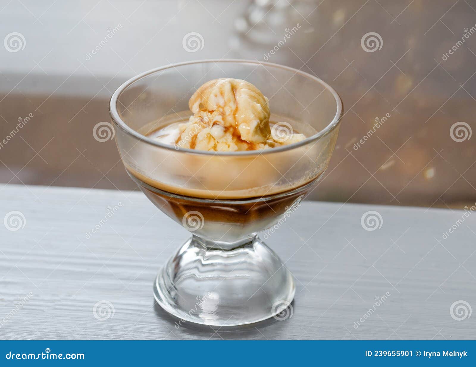 Vanilla Ice Cream with Coffee Expresso on a Cafe Table Stock Image