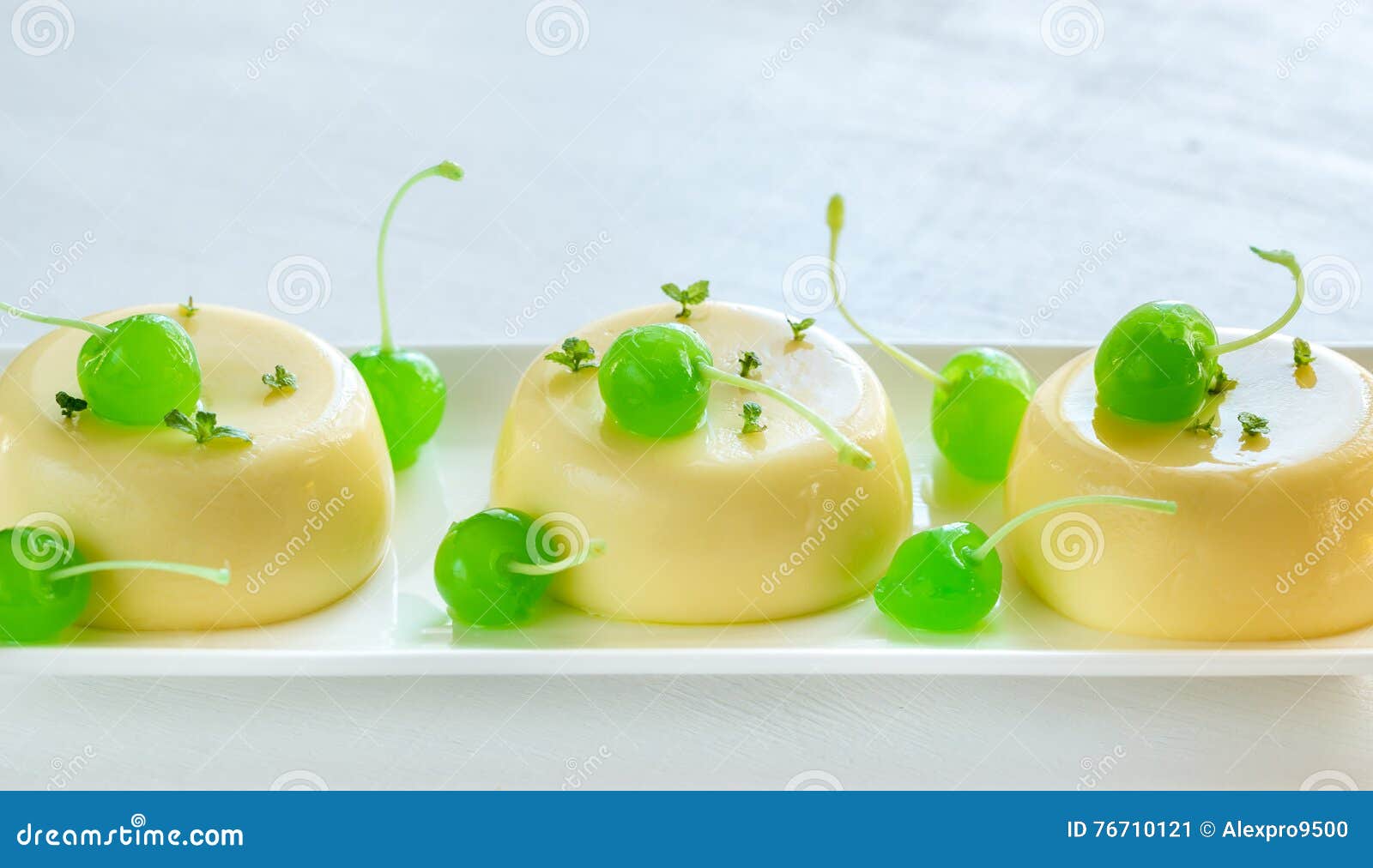 Vanilla Puddings Decorated with Cocktail Cherries Stock Image Image