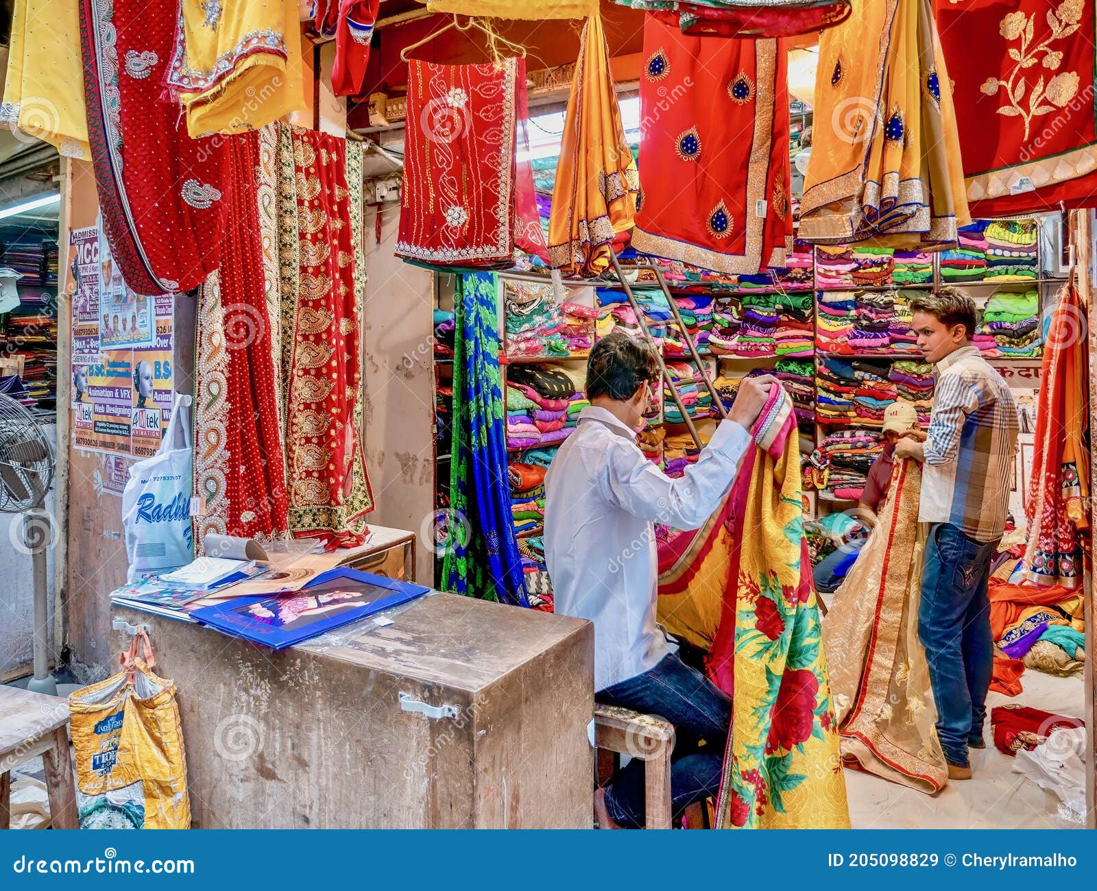 Brightly Colored Saris for Sale in a Market Stall in Varanasi, India. Editorial Stock Image - Image of asian, india: 205098829 Brightly Colored Saris for Sale in a Market Stall in Varanasi, India. Editorial Stock Image - Image of asian, india: 205098829