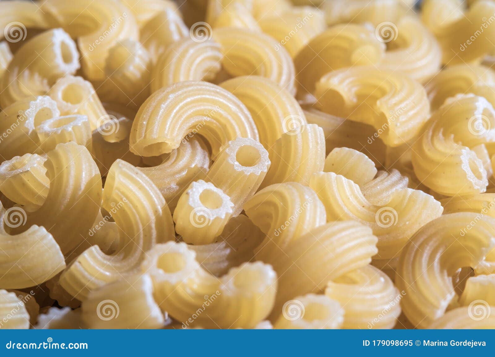Varieties of Pasta. Pasta from Wheat Flour Twisted Horns Closeup Stock