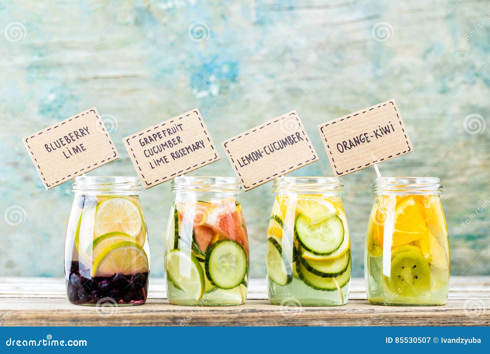 variety of fruit infused detox water in jars