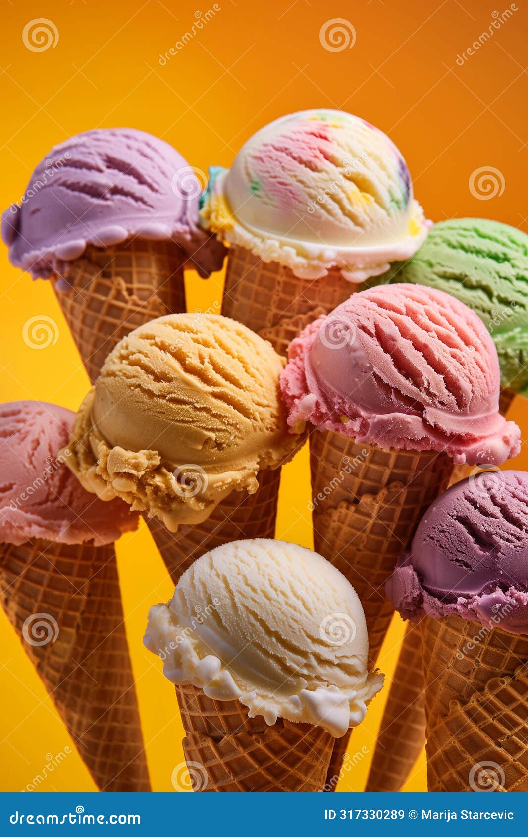 variety of ice cream cones with differenc flavours and colors