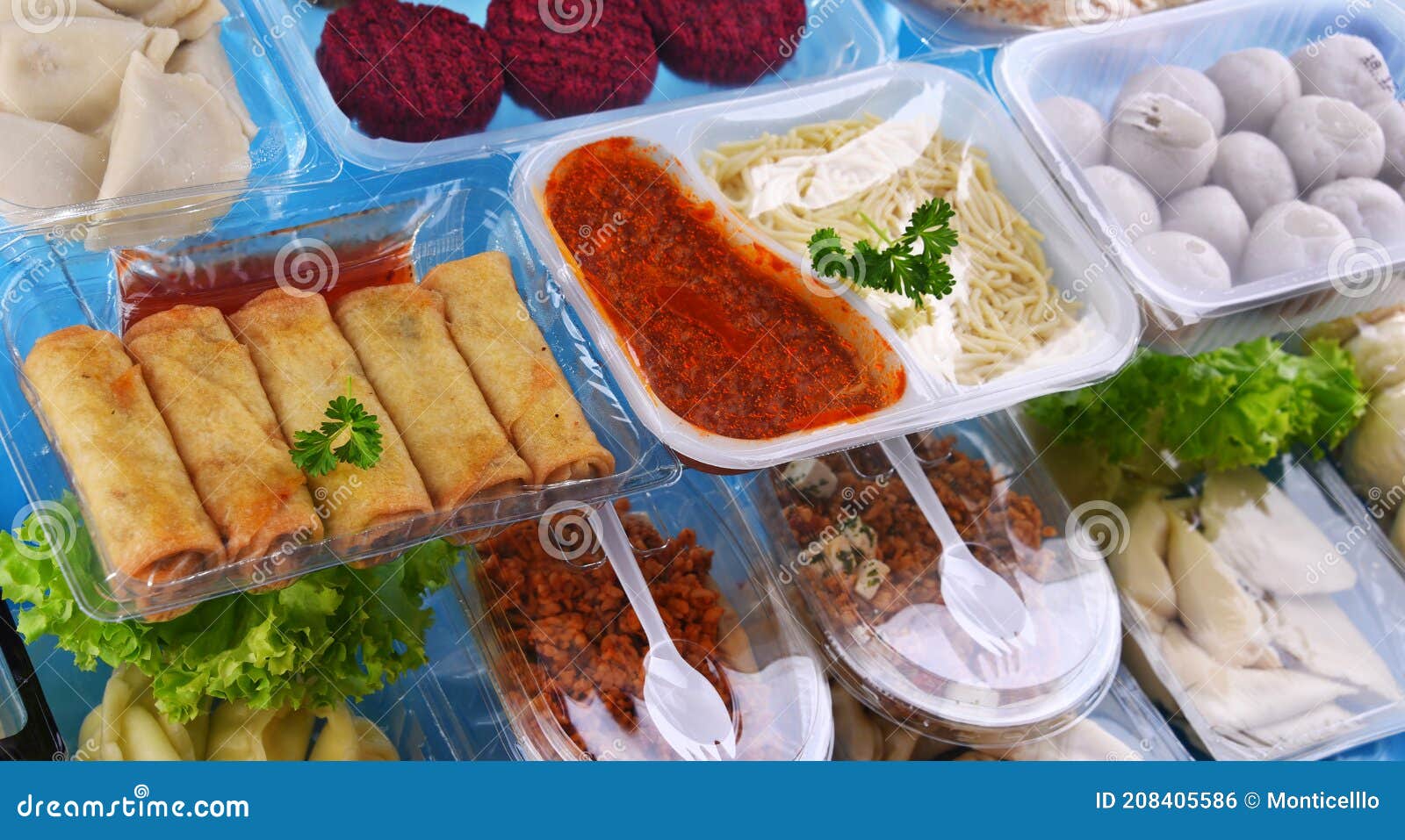 A Variety of Prepackaged Food Products in Plastic Boxes Stock Photo