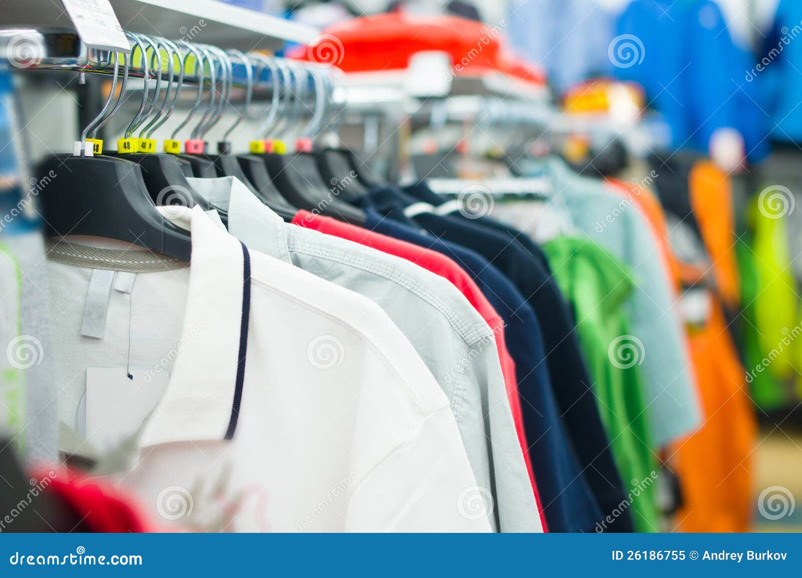 Variety of Shirts and T-shirts on Stands in Shop Stock Image - Image of ...