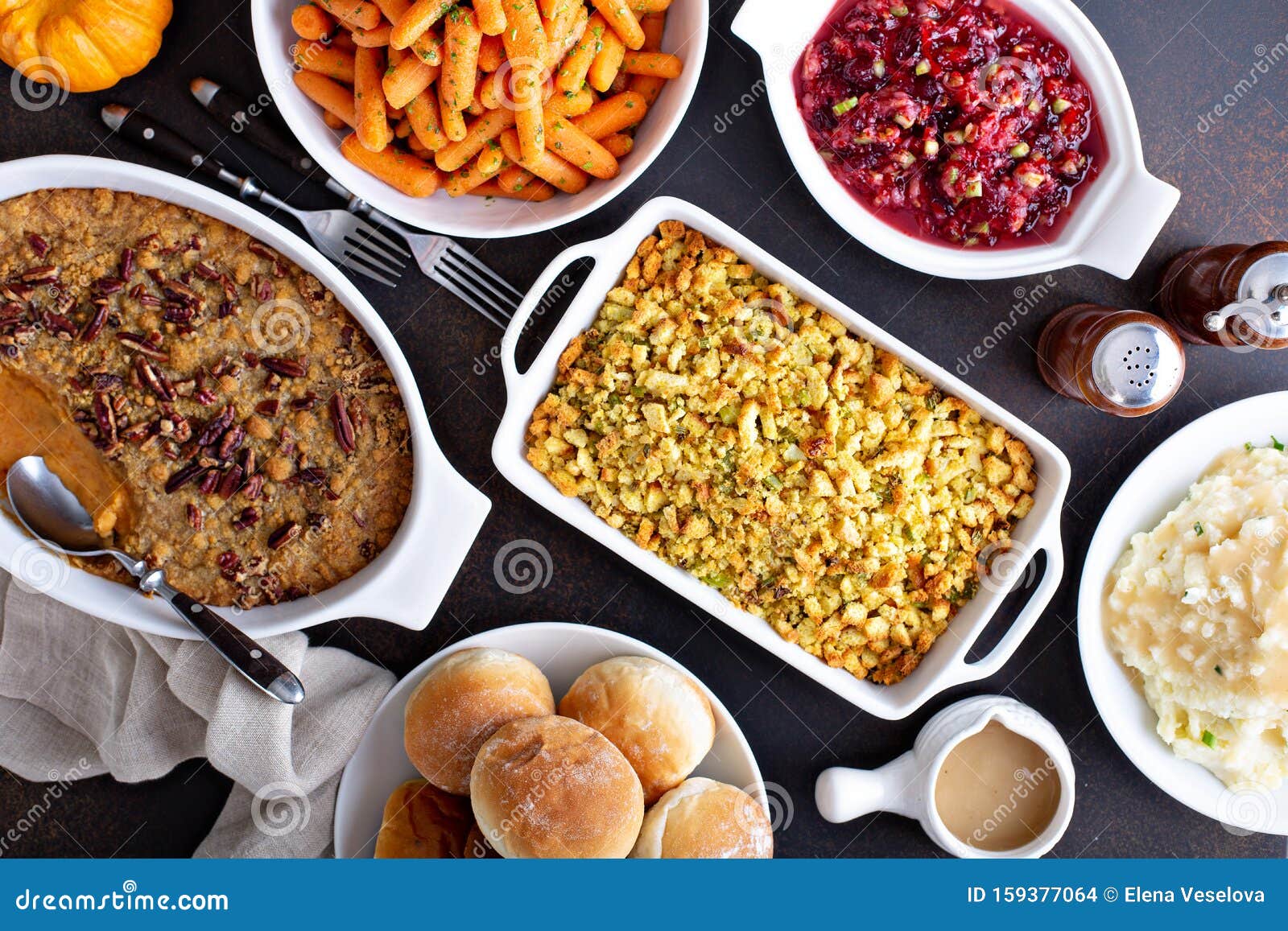 variety of thanksgiving sides on the table