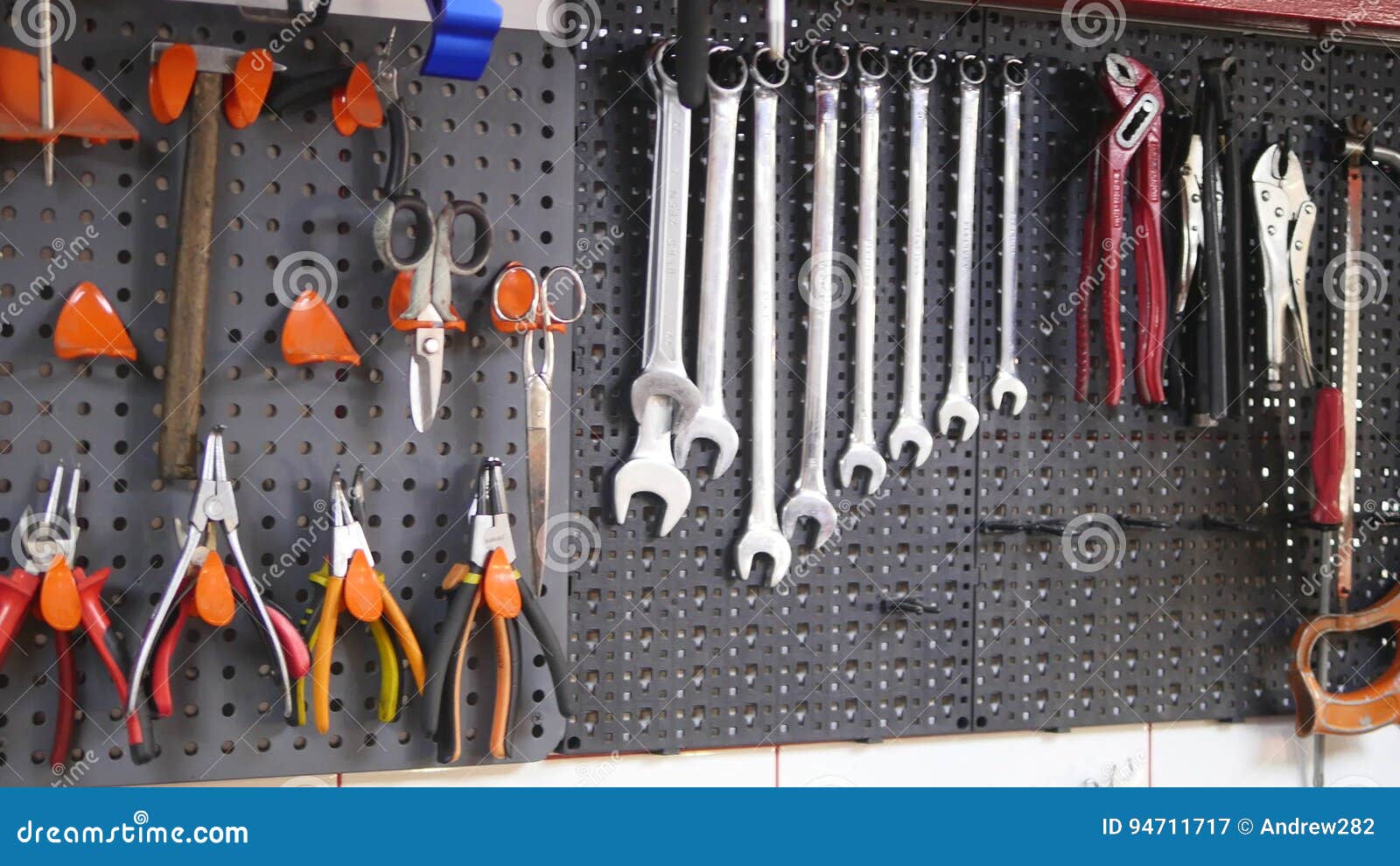 variety of tools organized on wall