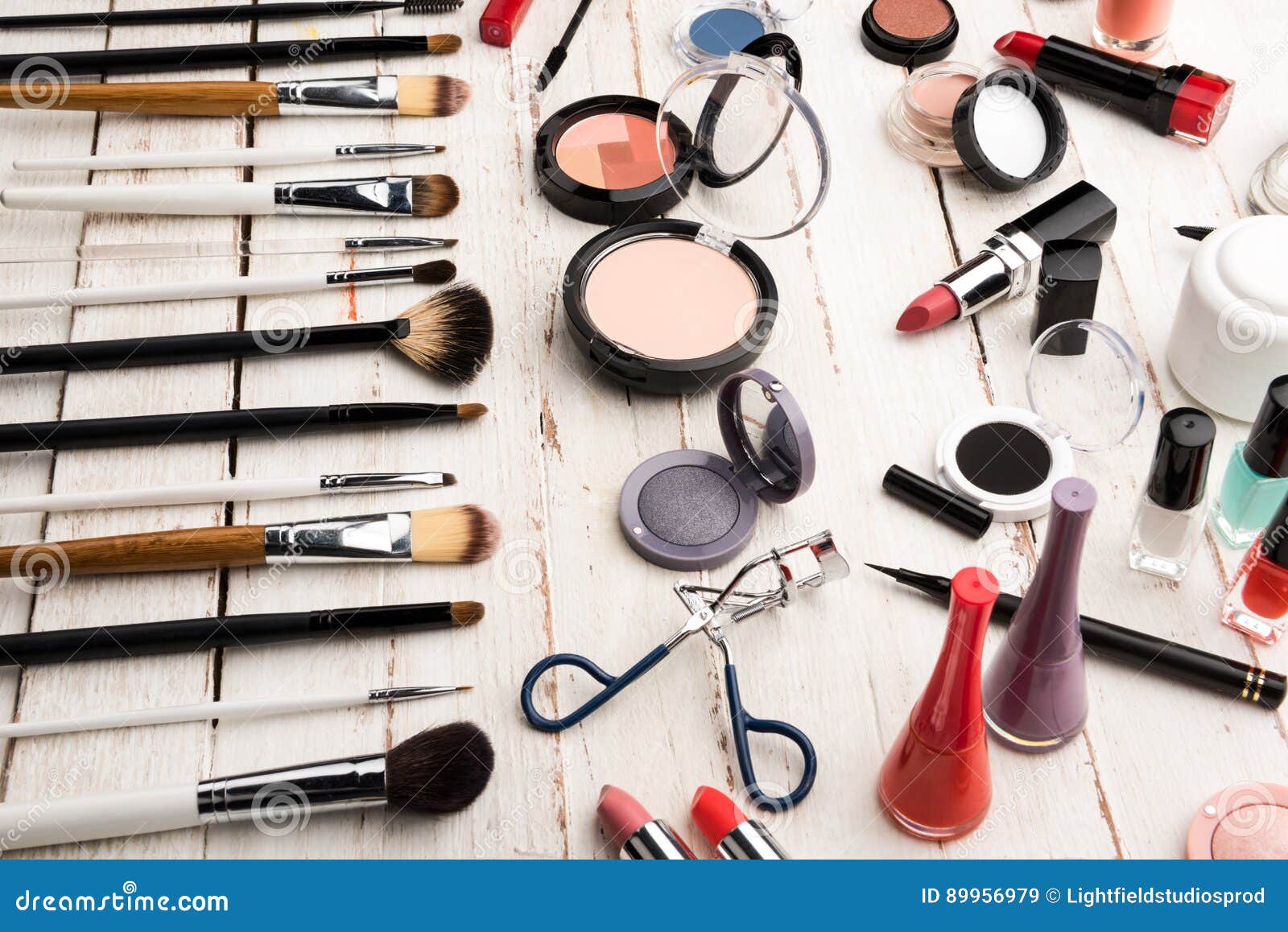 Various Brushes and Cosmetics for Applying Makeup on Table Stock Image