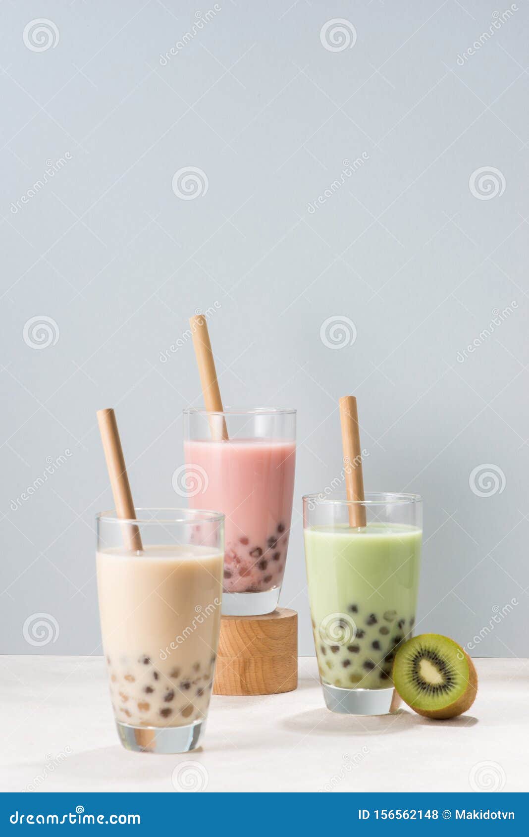 Various Bubble Tea Glasses With Drink Straws Isolated On White