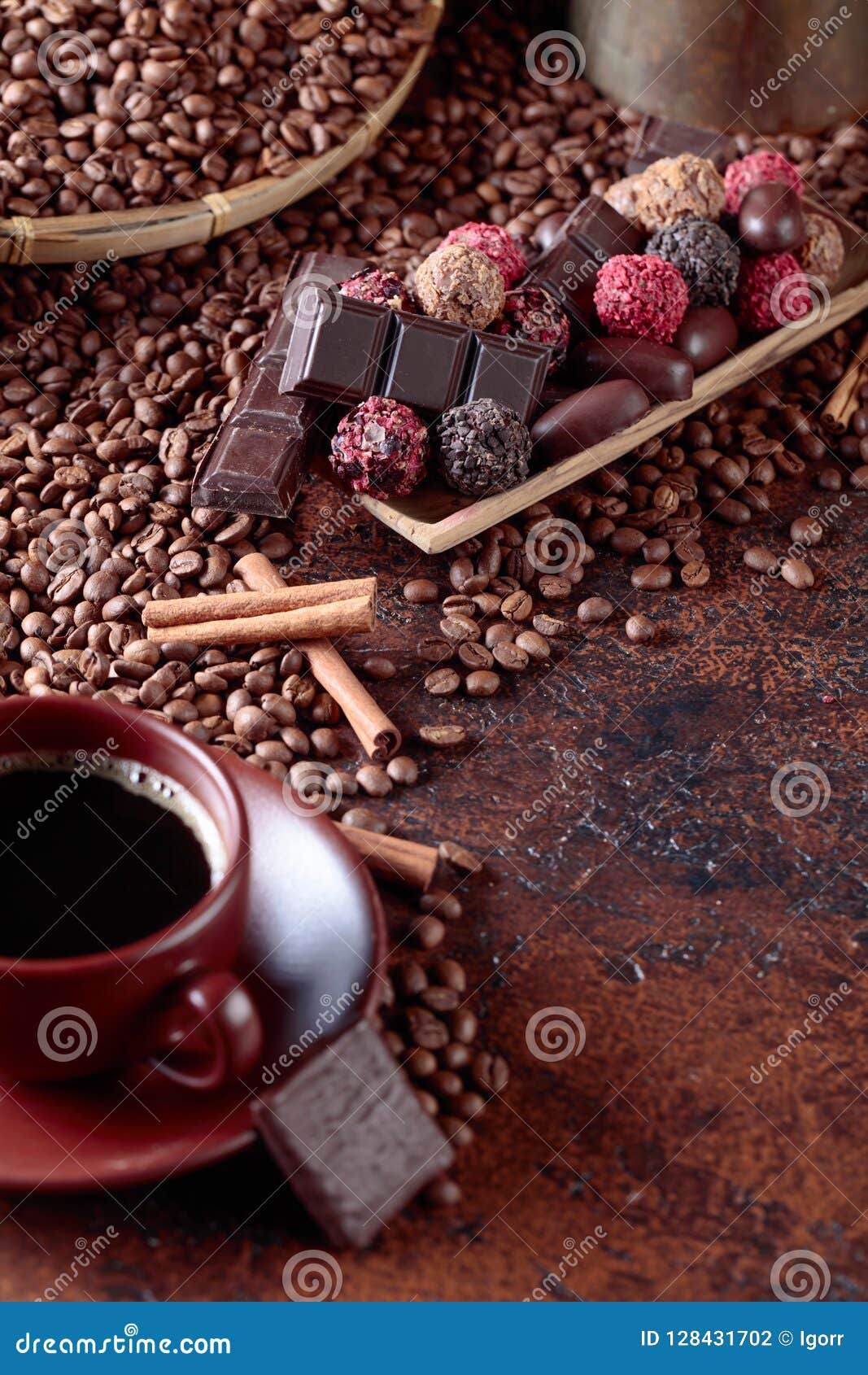 Various Chocolates and Cup of Black Coffee. Stock Photo Image of