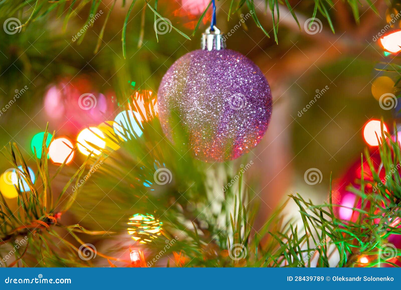 Various Christmas Toys on a Decorated Evergreen Tree Stock Image ...