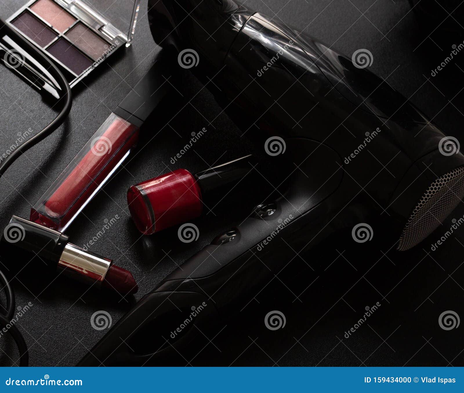 Various Cosmetics and Beauty Products on a Black Background. Close Up ...