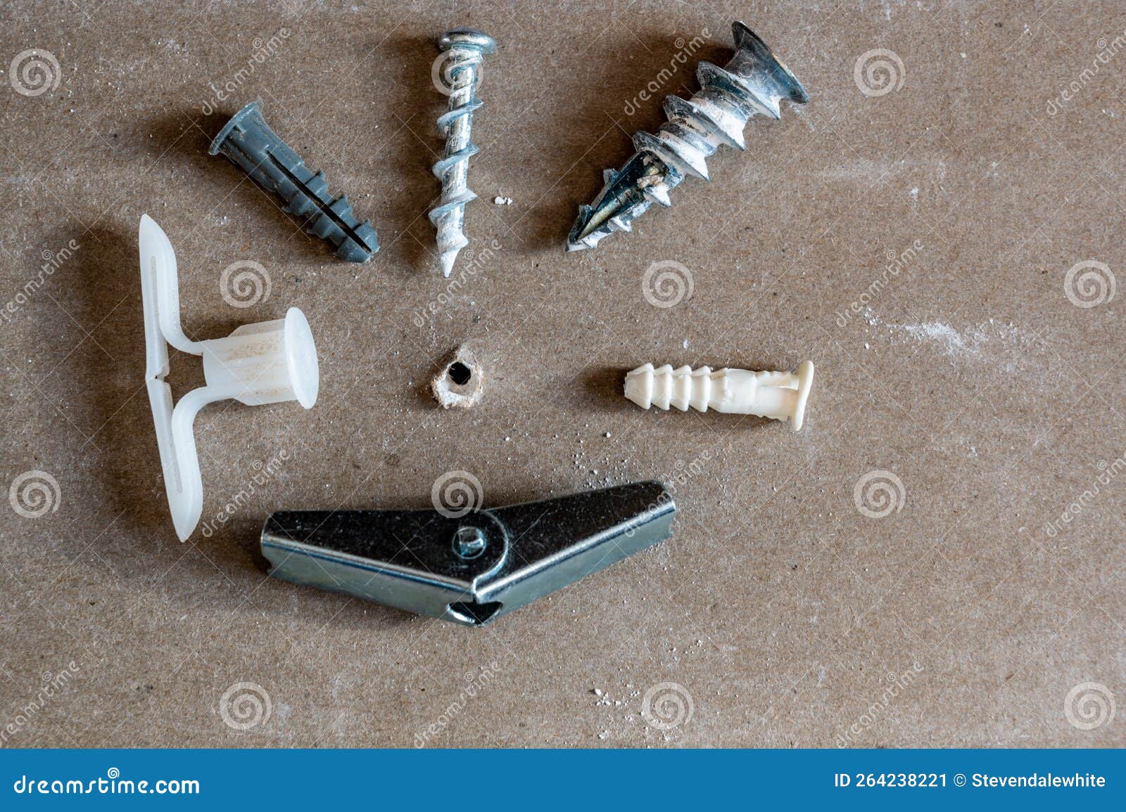 Assortment of Different Drywall Anchors Used for Hanging Objects on