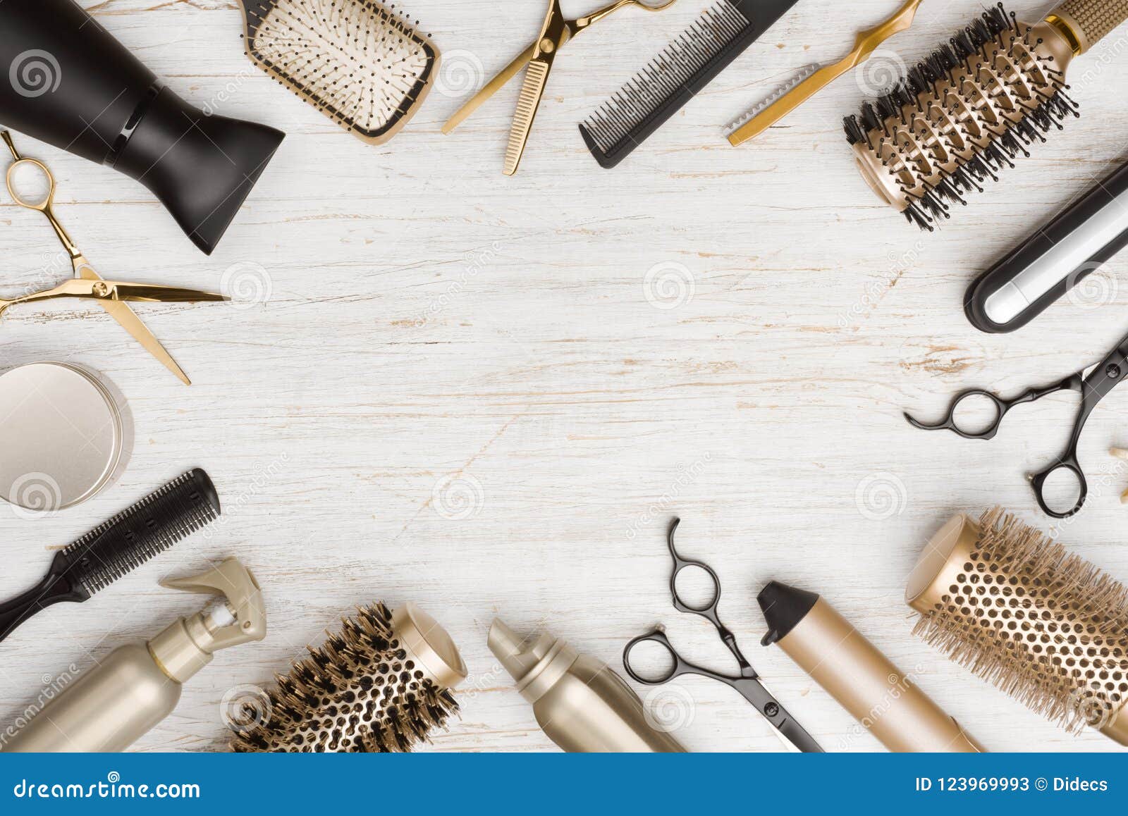 various hair dresser tools on wooden background with copy space