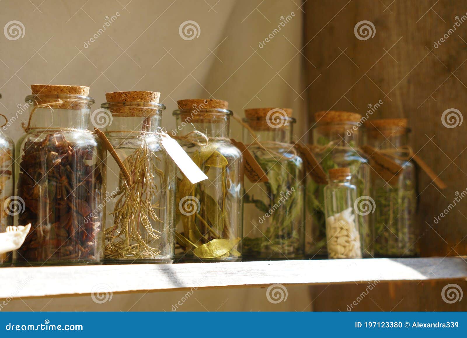 Various Herbs in Beautiful Glasses on Medieval Market Stock Photo