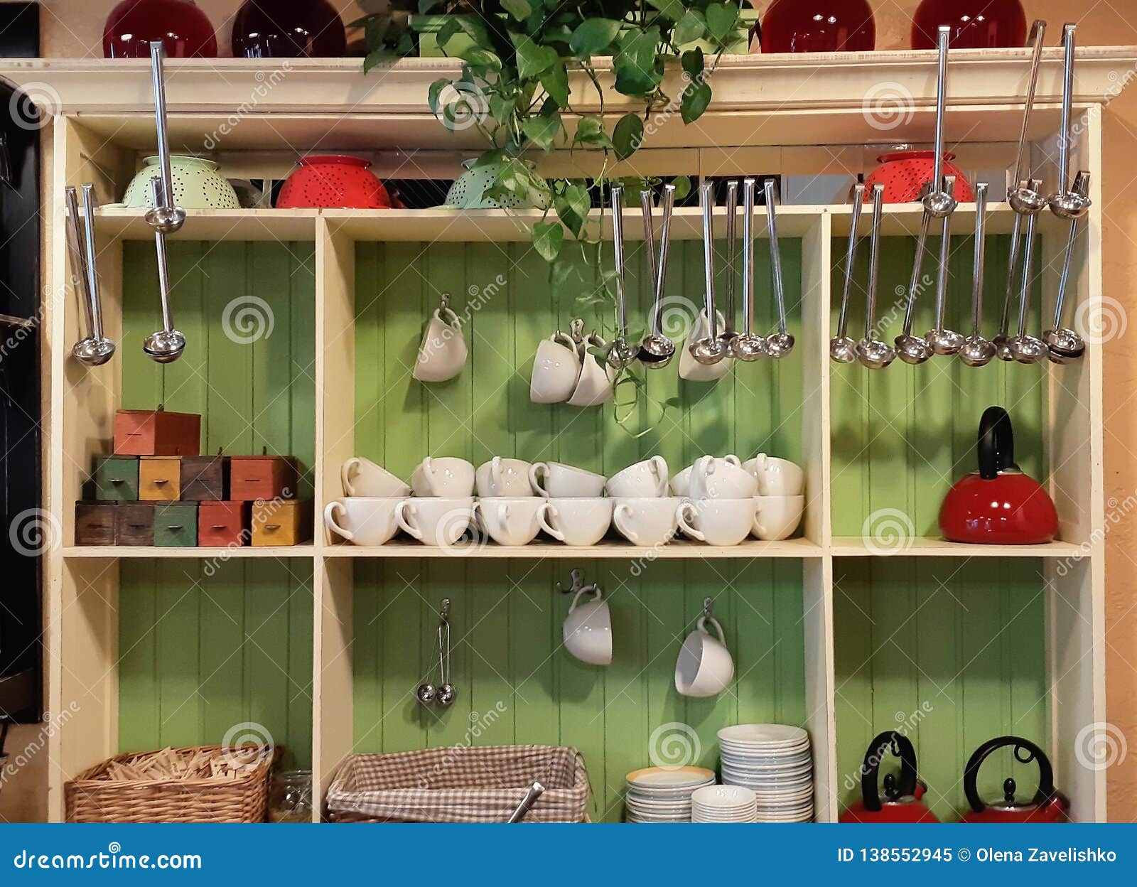 Various Lovely Accessories Standing on Shelf and Cupboard in Cozy