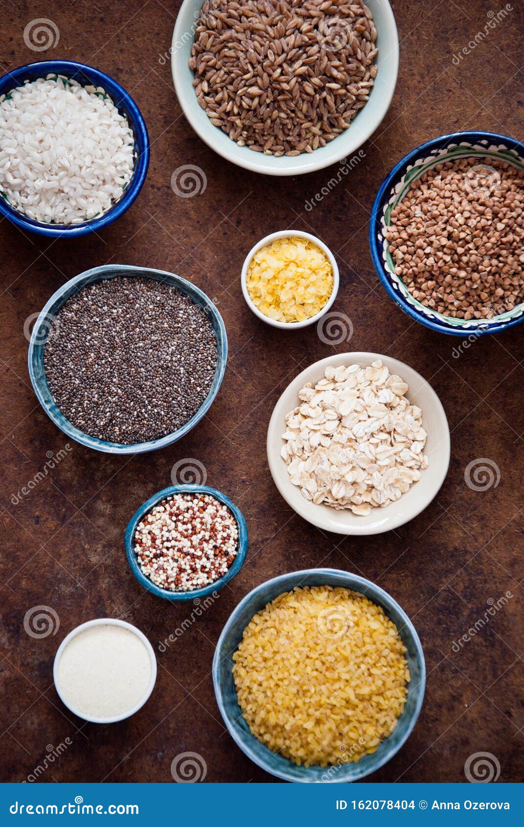 Various Organic Cereals and Grains in Different Bowls Stock Photo Image of dish, grain 162078404