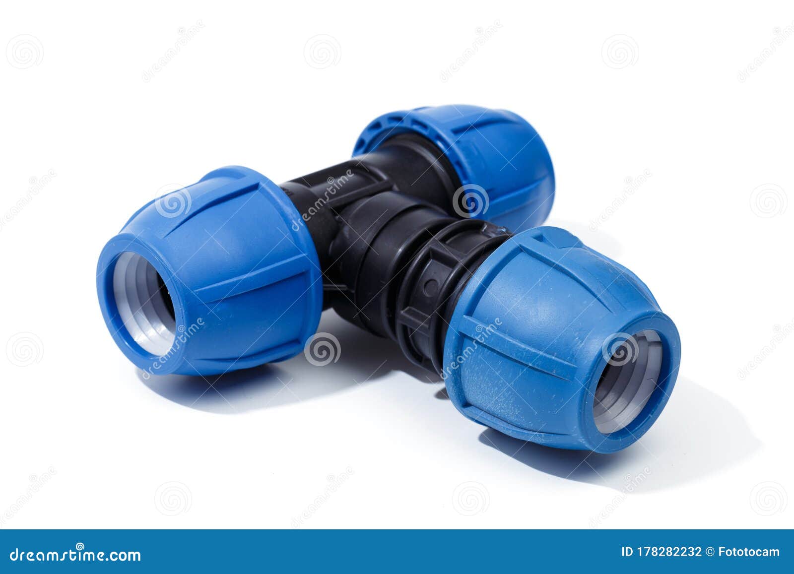 Various Plastic Fittings for Polypropylene Pipes on a White Background ...