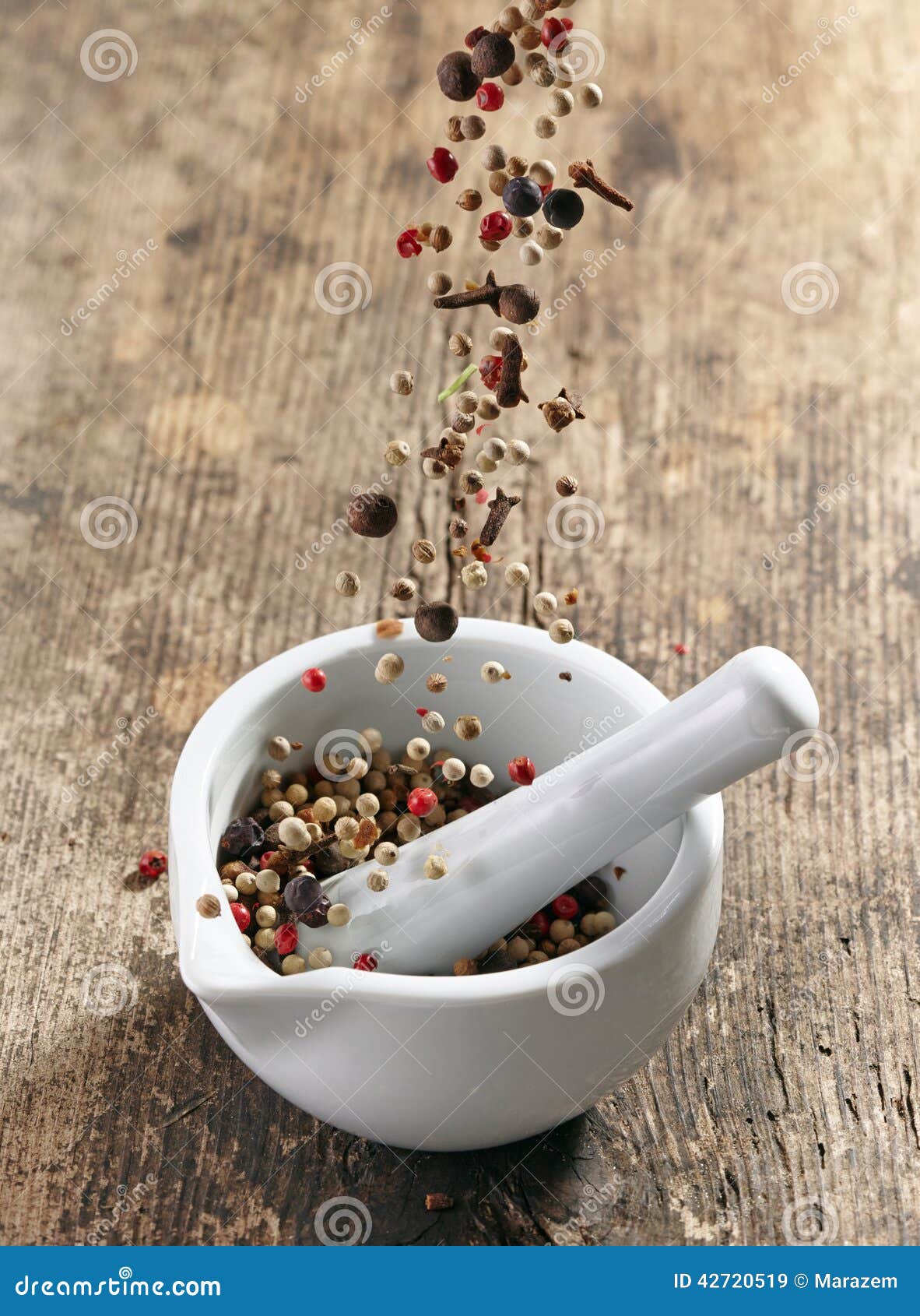 Various Spices Falling into Mortar and Pestle Stock Image Image of cuisine, closeup 42720519