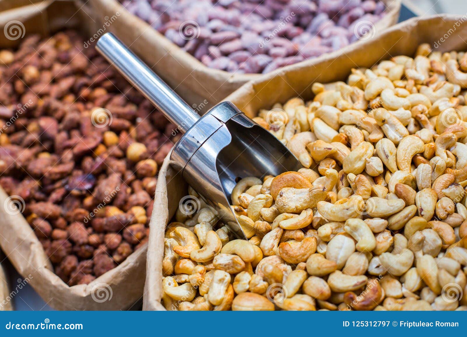 Various Sugared Nuts. Crispy Sugared Nuts. Oriental Sweets with a Variety of Nuts. Stock Image